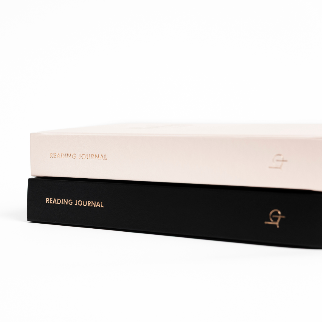Two 'Reading Journal' books stacked on a white background